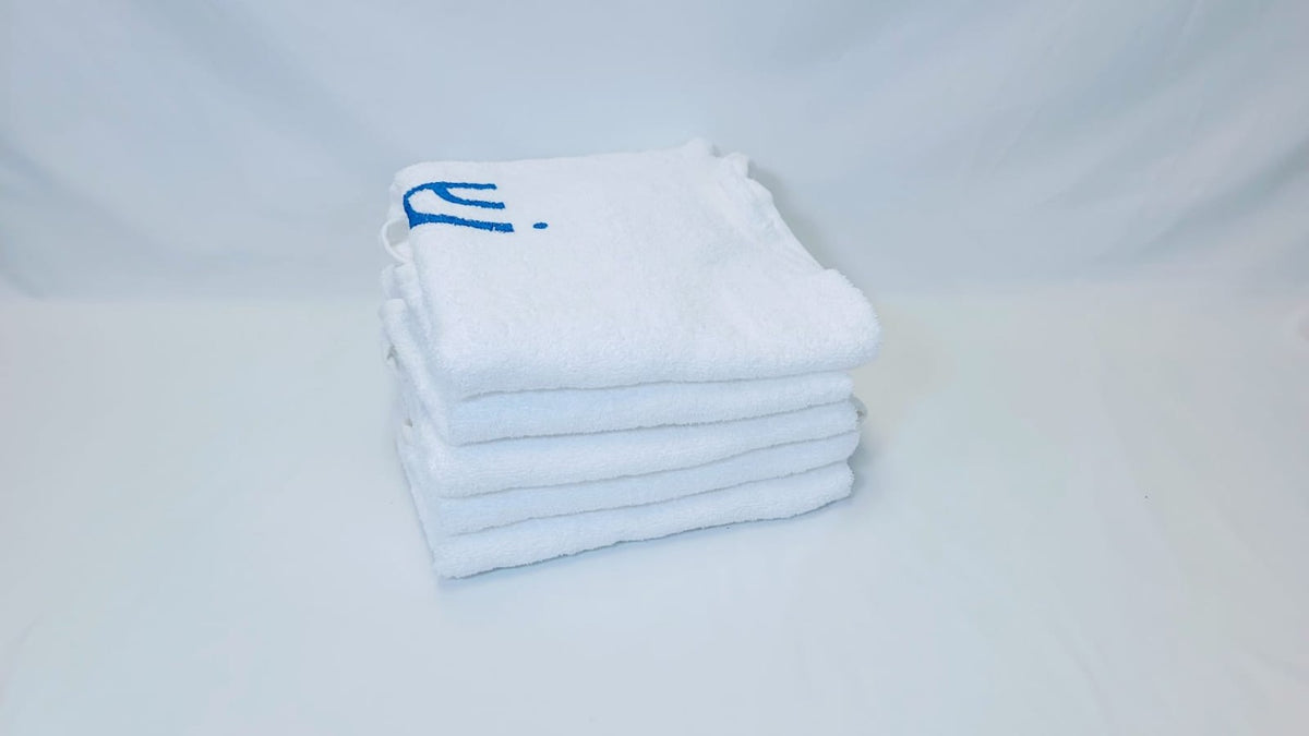 JADASH PRODUCTS White 100% Cotton Round Shoulder Towels folded stack
